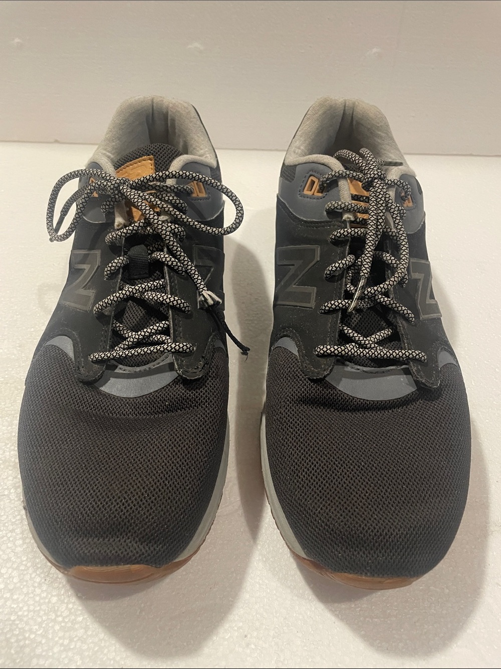 New Balance Men's Black and Gray Athletic Sneakers with Tan Accents